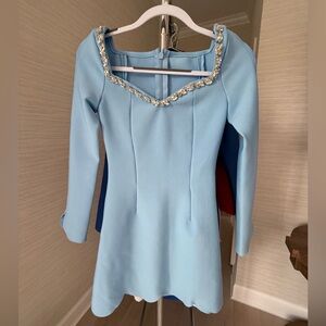 Elegant Blue Dress with Embellished Neckline